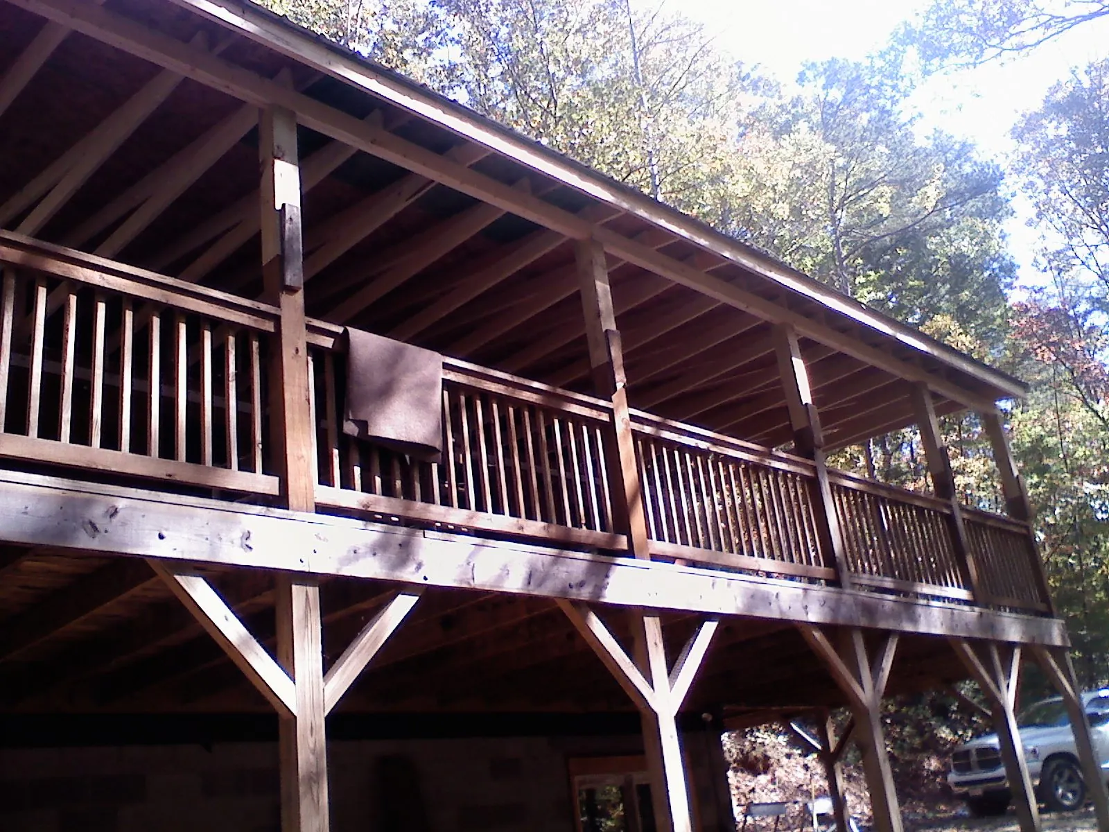 Timber framing under a new elevated porch and deck — Roof Leak Repair in Harrisville by Roofing Brothers